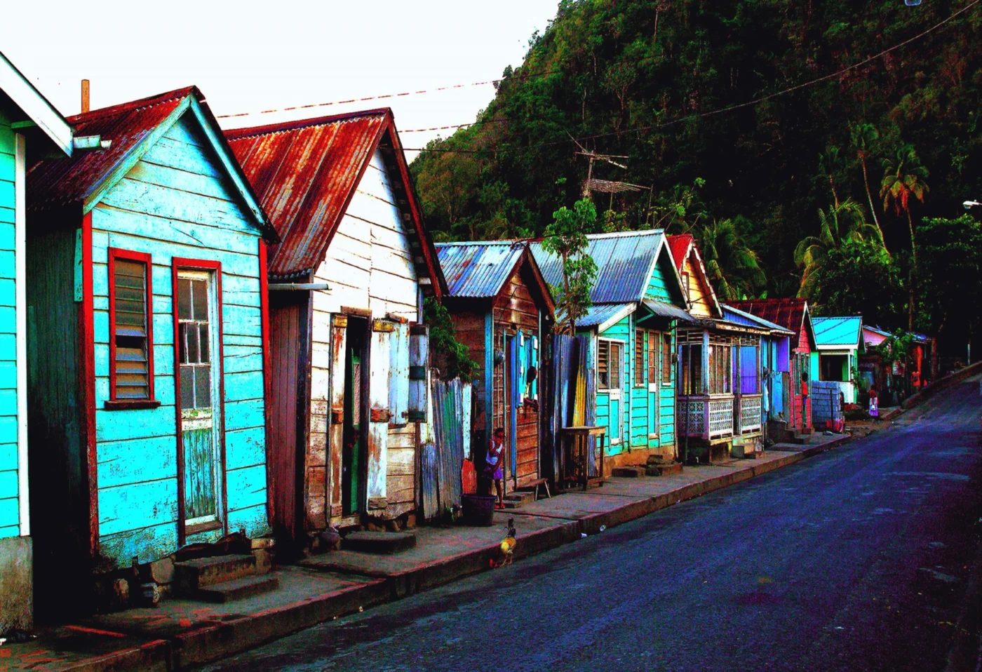 Colorful wooden houses along a Caribbean street