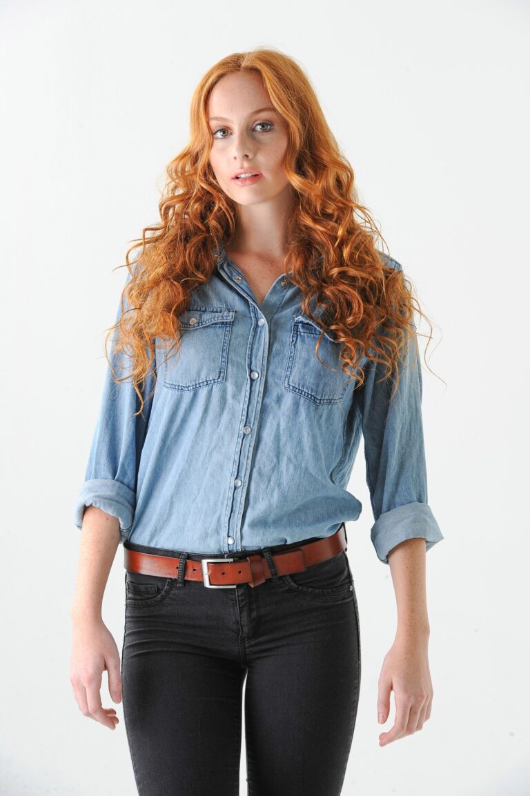 Three-quarter denim-shirt model portrait on white