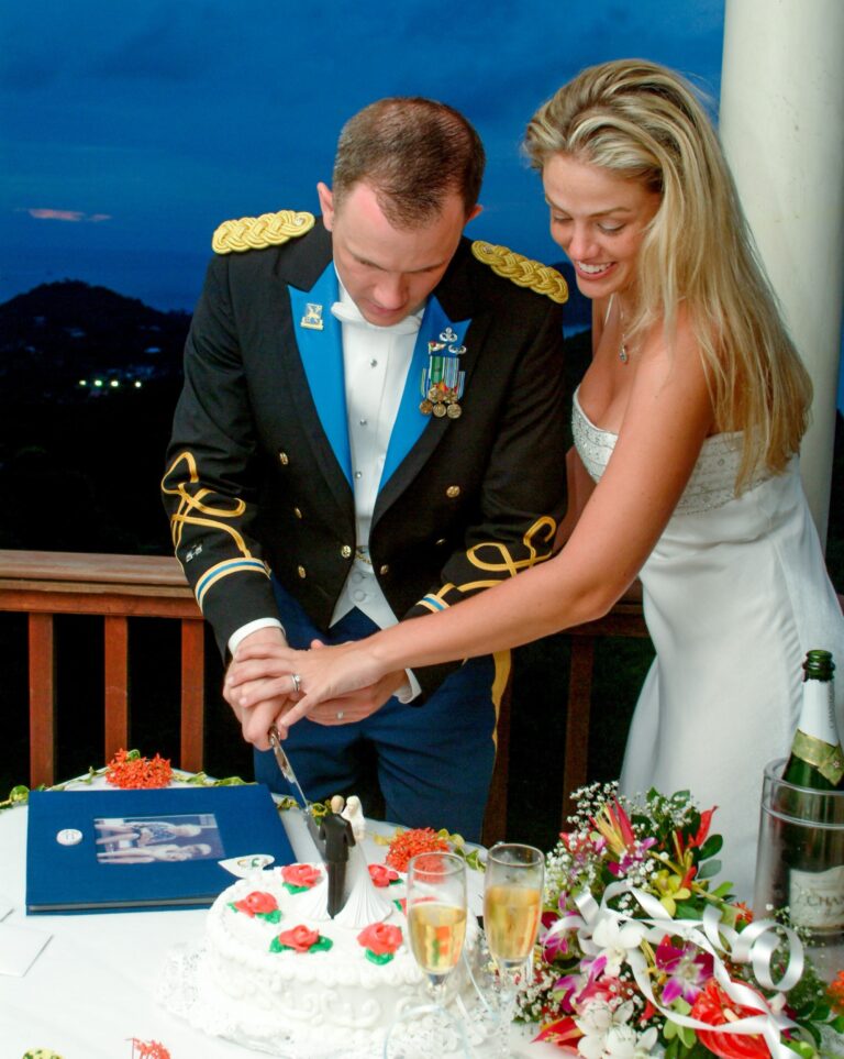Bride and groom cutting a cake