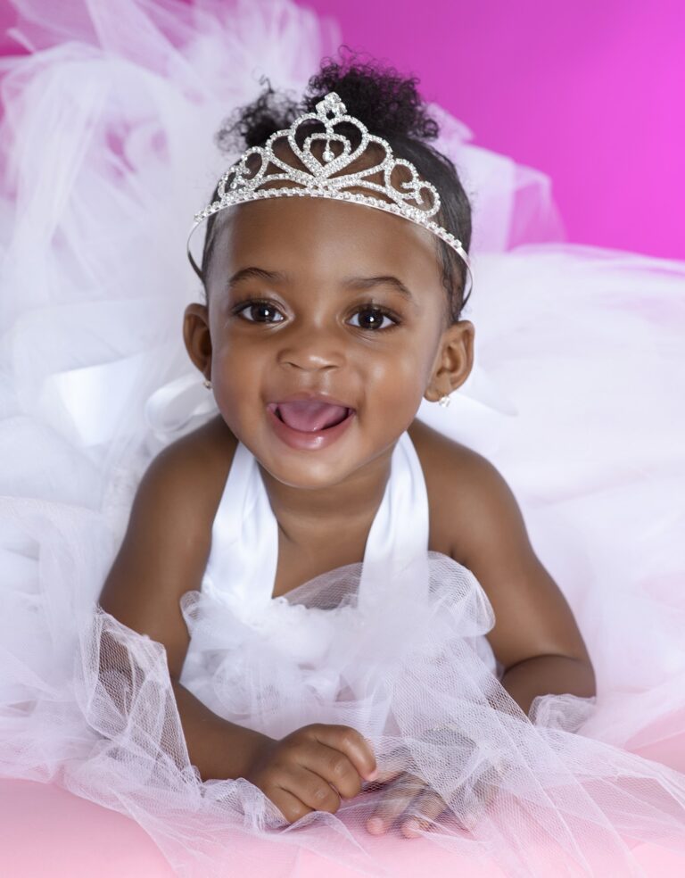 Baby in a pink tutu and crown