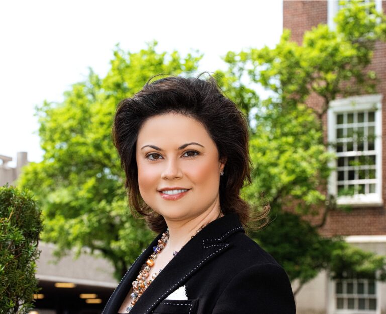 Woman in black jacket outdoors