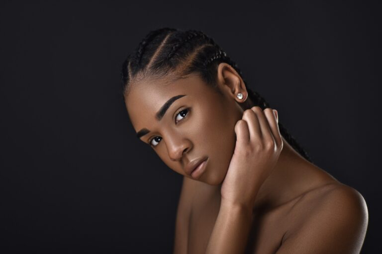 Beauty portrait with hand against cheek