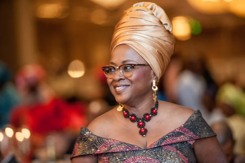Guest smiling at an evening celebration