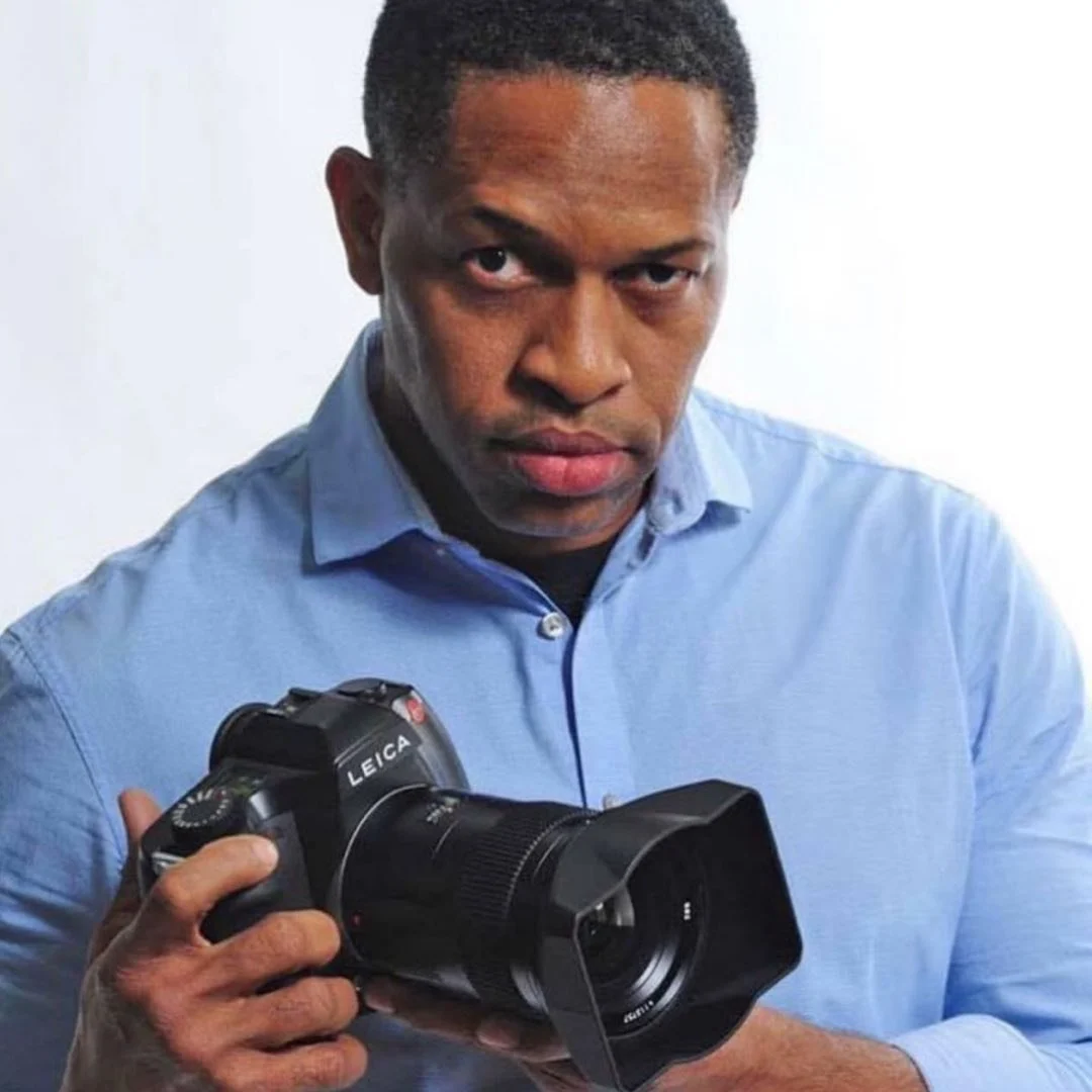 Stephen Paul holding a camera